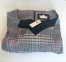 Load image into Gallery viewer, A folded plaid blazer with a black V-neck panel and attached price tag, displayed on a plain white surface.