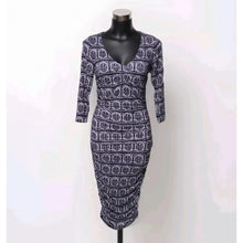 Load image into Gallery viewer, Patterned dress on a mannequin against a white background