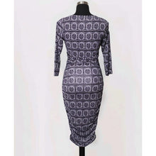 Load image into Gallery viewer, Patterned dress on a mannequin against a white background