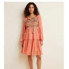 Load image into Gallery viewer, Woman wearing a peach-colored dress with a patterned top against a plain background