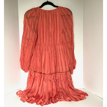 Load image into Gallery viewer, Coral-colored dress on a hanger against a plain background