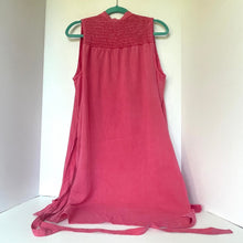 Load image into Gallery viewer, Pink sleeveless dress on a hanger against a white background