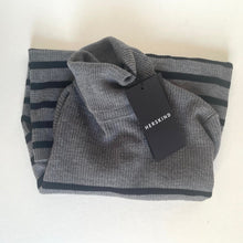 Load image into Gallery viewer, Folded gray and black striped blanket with a Herskin tag on a white background