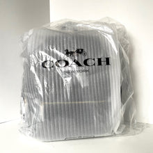 Load image into Gallery viewer, Coach New York cap in clear plastic packaging on a white background