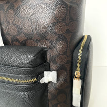 Load image into Gallery viewer, Black leather backpack with gold zipper and pattern on a white background