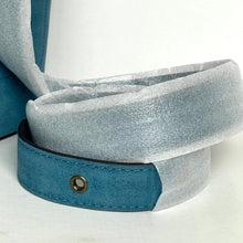 Load image into Gallery viewer, Gray glittery headband with a blue band on a white background