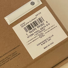 Load image into Gallery viewer, Barcode label on a cardboard surface with product details.