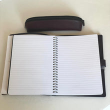 Load image into Gallery viewer, Open notebook with lined pages on a white surface