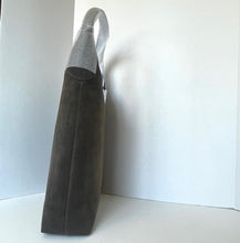 Load image into Gallery viewer, Gray suede handbag on a white background