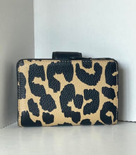 Load image into Gallery viewer, Leopard print wallet on a white surface with a white wall background