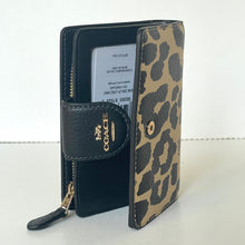 Load image into Gallery viewer, Coach wallet with leopard print design on a white background