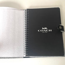 Load image into Gallery viewer, Black Coach notebook with logo on a white background