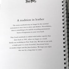 Load image into Gallery viewer, Coach notebook with text about a tradition in leather and branding details.
