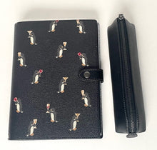 Load image into Gallery viewer, Black leather wallet with dog pattern and matching black pouch on a white background