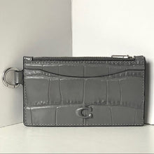 Load image into Gallery viewer, Gray crocodile-textured wallet with a key ring on a white background