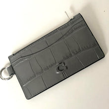 Load image into Gallery viewer, Gray crocodile-patterned wallet with a key ring on a light beige background