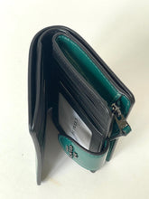 Load image into Gallery viewer, Teal wallet with a visible brand logo on a white background