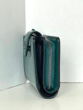 Load image into Gallery viewer, Green wallet with a zipper on a white background