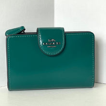 Load image into Gallery viewer, Green Coach wallet on a white background