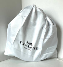 Load image into Gallery viewer, White Coach bag with logo on a light gray background