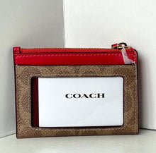 Load image into Gallery viewer, Coach wallet with red top flap and brown body on a white background