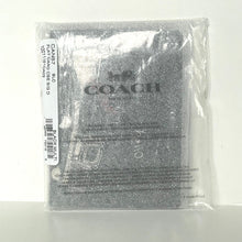 Load image into Gallery viewer, Coach phone case packaging on a white background