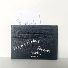 Load image into Gallery viewer, Black leather cardholder with text on a white background