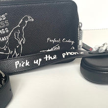 Load image into Gallery viewer, Black leather wallet with white text and a lizard design on a white background