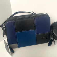 Load image into Gallery viewer, Blue and black patchwork handbag on a white background