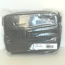 Load image into Gallery viewer, Black car cover in clear plastic packaging with a label on a white background