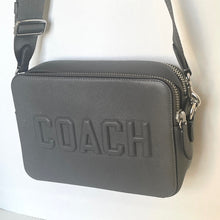 Load image into Gallery viewer, Gray Coach shoulder bag on a light background
