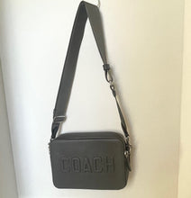 Load image into Gallery viewer, Gray Coach shoulder bag on a white background