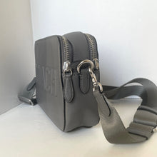 Load image into Gallery viewer, Gray leather crossbody bag with a strap on a white background