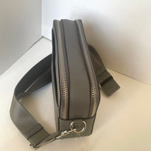 Load image into Gallery viewer, Gray leather bag with a zipper on a light background