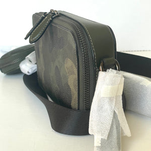 Black camouflage-patterned bag with a strap on a white background