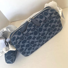 Load image into Gallery viewer, Blue patterned pouches on a white surface