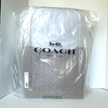 Load image into Gallery viewer, Coach New York bag in clear plastic packaging on a white background