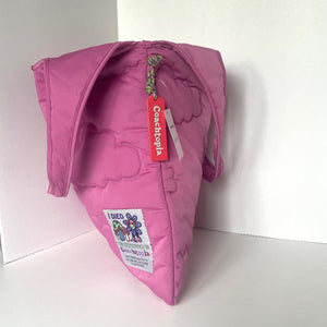 Pink jacket with a brand tag on a white background