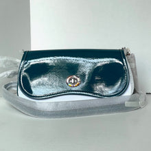 Load image into Gallery viewer, Blue and silver handbag with a visible brand logo on a white background