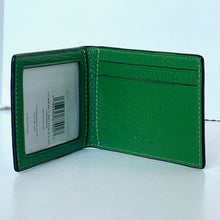 Load image into Gallery viewer, Green leather wallet open on a light gray background