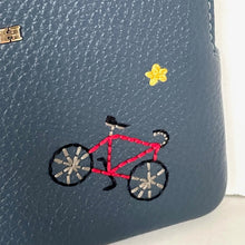 Load image into Gallery viewer, Blue leather bag with embroidered bicycle and star design