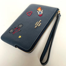 Load image into Gallery viewer, Blue wallet with embroidered designs on a white background
