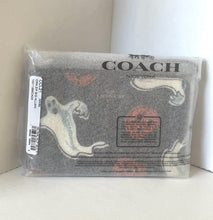 Load image into Gallery viewer, Coach wallet in packaging on a white surface