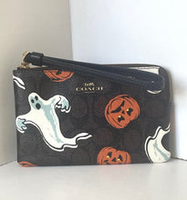 Load image into Gallery viewer, Coach wallet with Halloween-themed design on a white surface