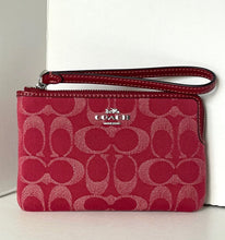 Load image into Gallery viewer, Red Coach wristlet with logo on a white background