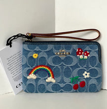 Load image into Gallery viewer, Coach wallet with rainbow and floral design on a white background