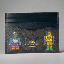 Load image into Gallery viewer, Coach Cosmic Slim Id Card Case Robot Print Black Signature Canvas CW929