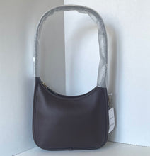 Load image into Gallery viewer, Dark brown handbag with a visible tag on a light gray background