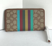Load image into Gallery viewer, Coach Dempsey Large Phone Wallet Womens Signature Jacquard Stripe Patch CC890