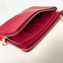 Load image into Gallery viewer, Red clutch bag with gold zipper on a white background